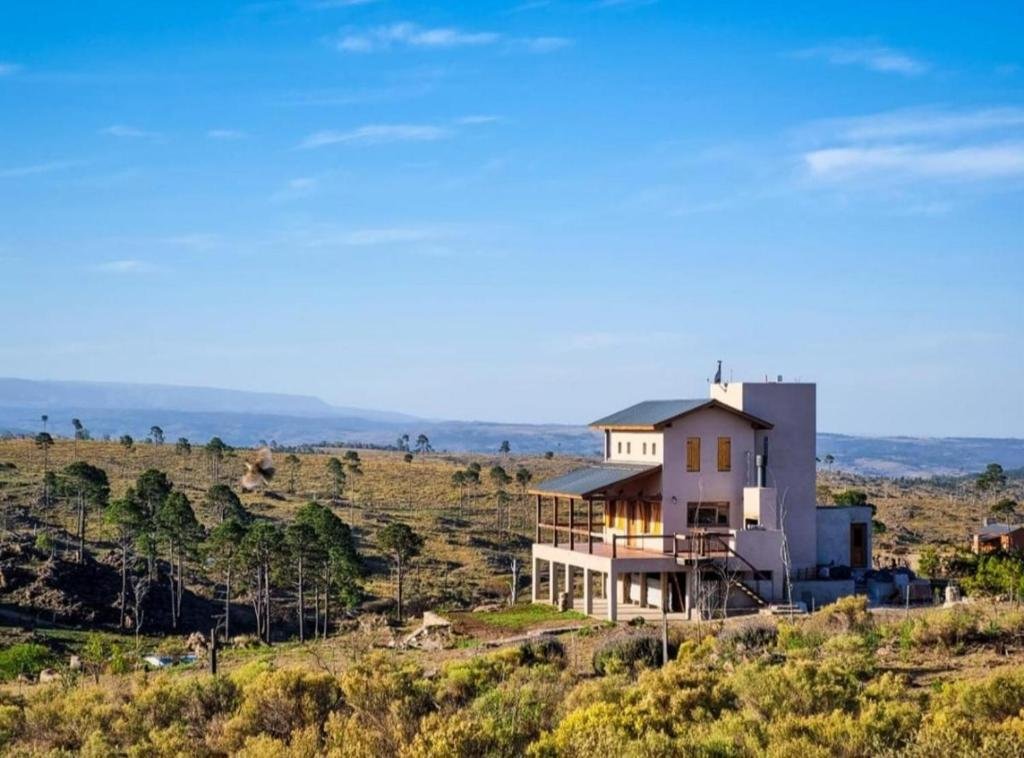 Cabañas Casa Flor Yacanto con pileta y jardín